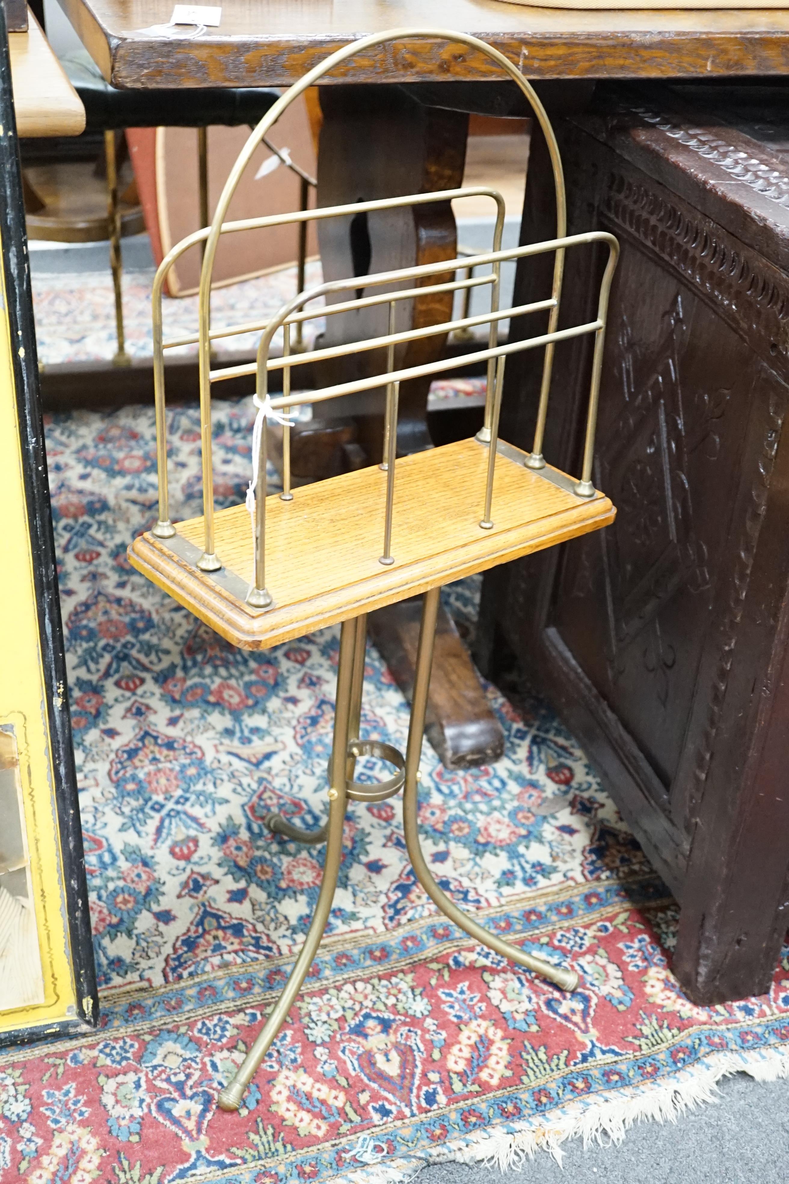 An Edwardian tubular brass and oak magazine rack, height 79cm